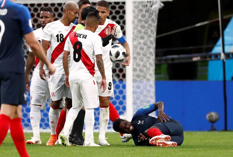 France's Samuel Umtiti reacts after sustaining an injury. Damir Sagolj / Reuters
