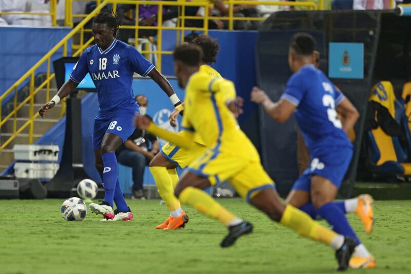 Al Hilal forward Bafetimbi Gomis runs with the ball. AFP