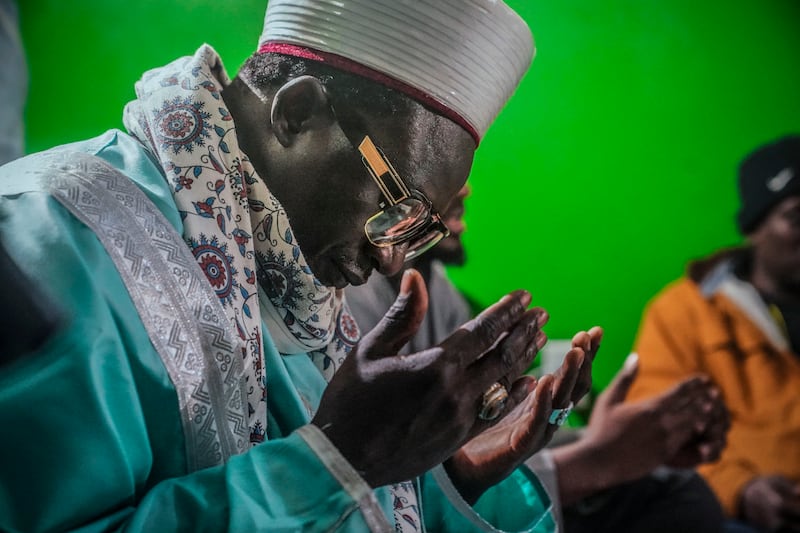 An imam prays before iftar at Bronx's Masjid Ansarudeen in New York. AP