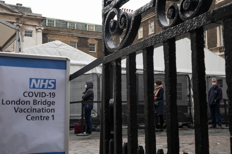 People queue for a Covid-19 vaccination at a vaccination hub at Guys Hospital in London, England. Getty Images