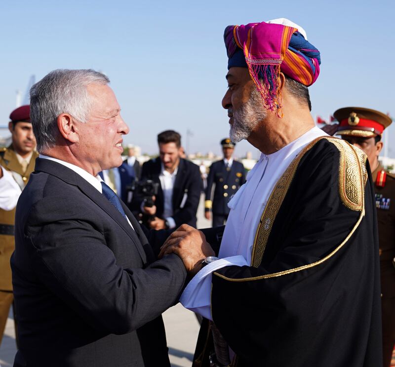 Oman's Sultan Haitham greets Jordan's King Abdullah II, Queen Rania and Crown Prince Hussein bin Abdullah upon their arrival at the airport in Muscat. Photo: The Royal Hashemite Court