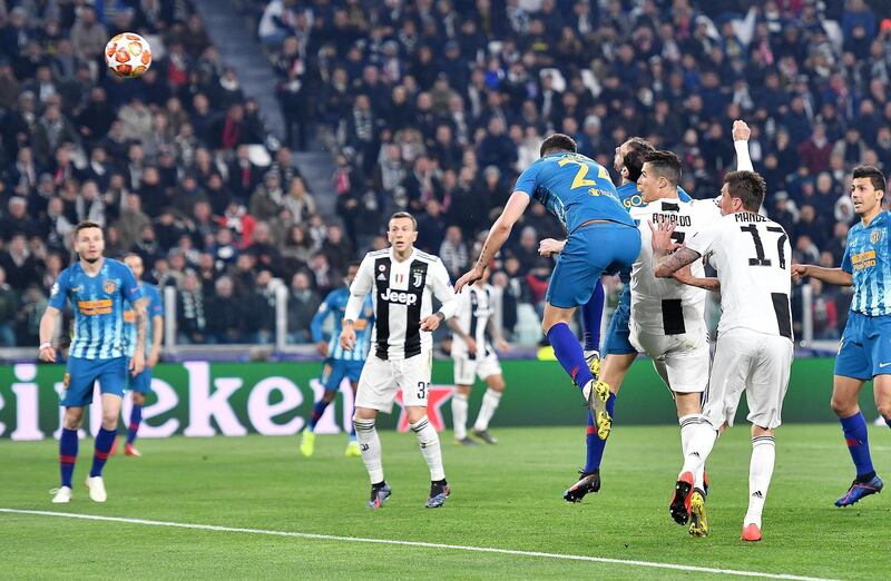 Juventus' Cristiano Ronaldo scores with a header to make it 2-0 on the night. EPA
