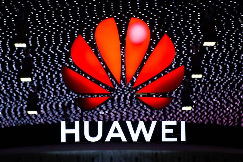 BARCELONA, SPAIN - FEBRUARY 26:  A logo sits illumintated outside the Huawei booth on day 2 of the GSMA Mobile World Congress 2019 on February 26, 2019 in Barcelona, Spain. The annual Mobile World Congress hosts some of the world's largest communications companies, with many unveiling their latest phones and wearables gadgets like foldable screens and the introduction of the 5G wireless networks. (Photo by David Ramos/Getty Images)