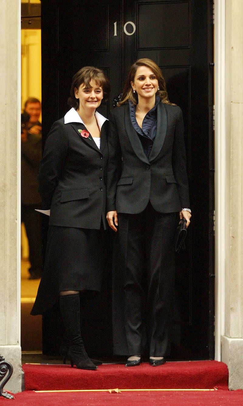 397031 02: (UK OUT) Cherie Blair (L), the wife of British Prime Minister Tony Blair greets Queen Rania of Jordan on the steps of No.10 Downing Street ahead of a meeting between their respective husbands over the current war against terrorism November 8, 2001 in London. (Photo by Jonathan Evans/BWP Media/Getty Images)