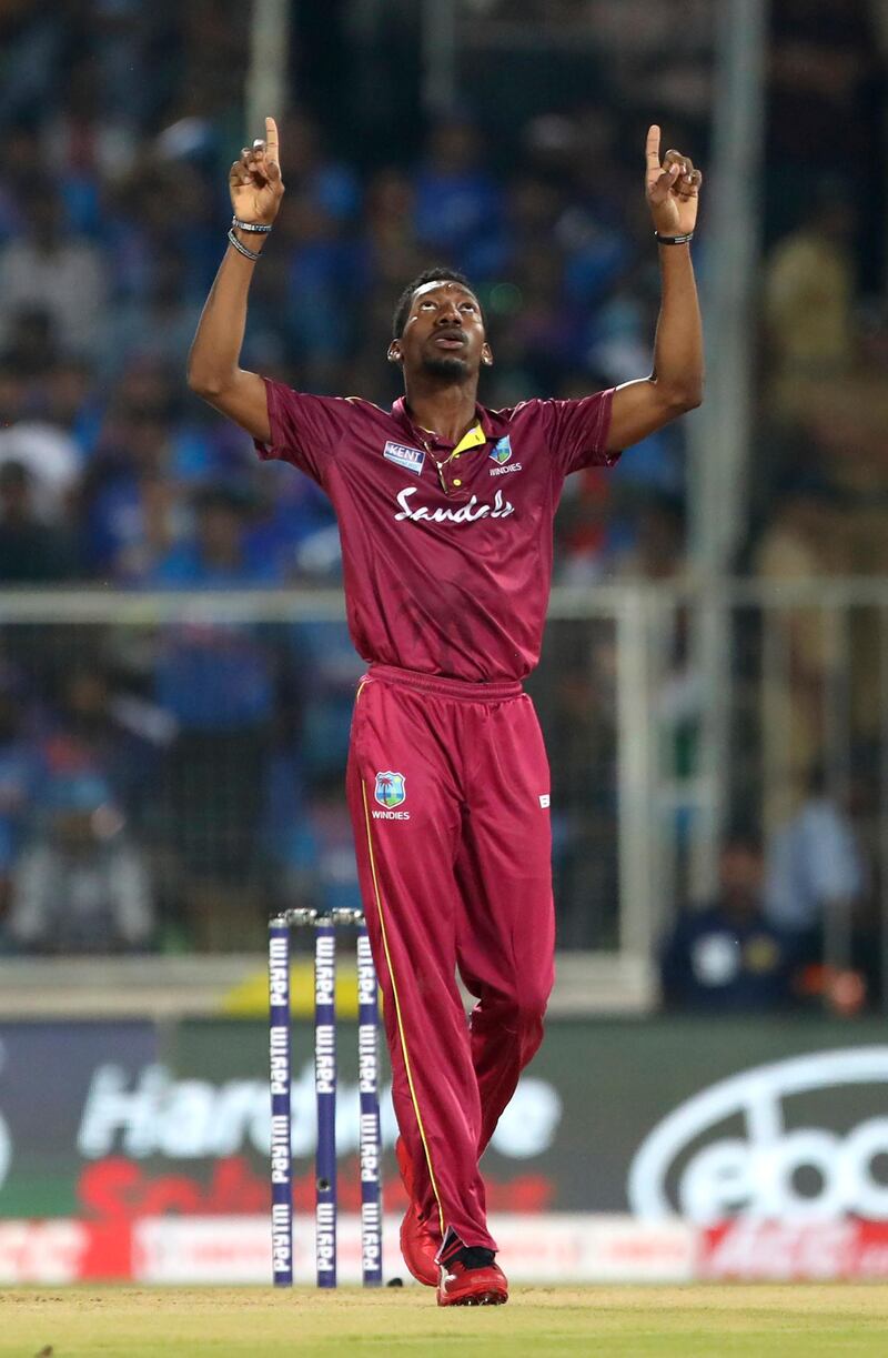 West Indies' Khary Pierre celebrates the dismissal of KL Rahul. AP