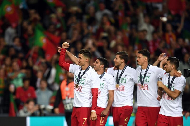 Cristiano Ronaldo and his Portugal teammates celebrate winning the Nations League. AFP