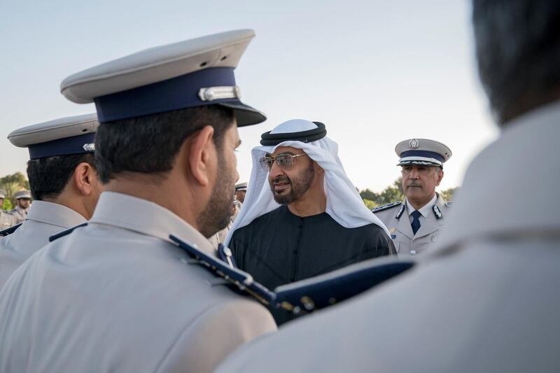 AL AIN, ABU DHABI, UNITED ARAB EMIRATES - December 04, 2017: HH Sheikh Mohamed bin Zayed Al Nahyan, Crown Prince of Abu Dhabi and Deputy Supreme Commander of the UAE Armed Forces (C), receives members of Abu Dhabi Police, during a barza, at Al Maqam Palace. Seen with HE Major General Mohamed Khalfan Al Romaithi, Commander in Chief of Abu Dhabi Police and Abu Dhabi Executive Council Member (R).

( Mohamed Al Hammadi / Crown Prince Court - Abu Dhabi )
---