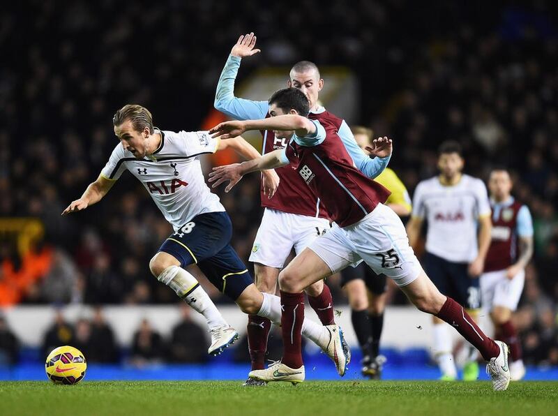 Harry Kane of Tottenham Hotspur is closed down by Michael Keane of Burnley during their English Premier League match at White Hart Lane on December 20, 2014 in London, England. Laurence Griffiths / Getty Images