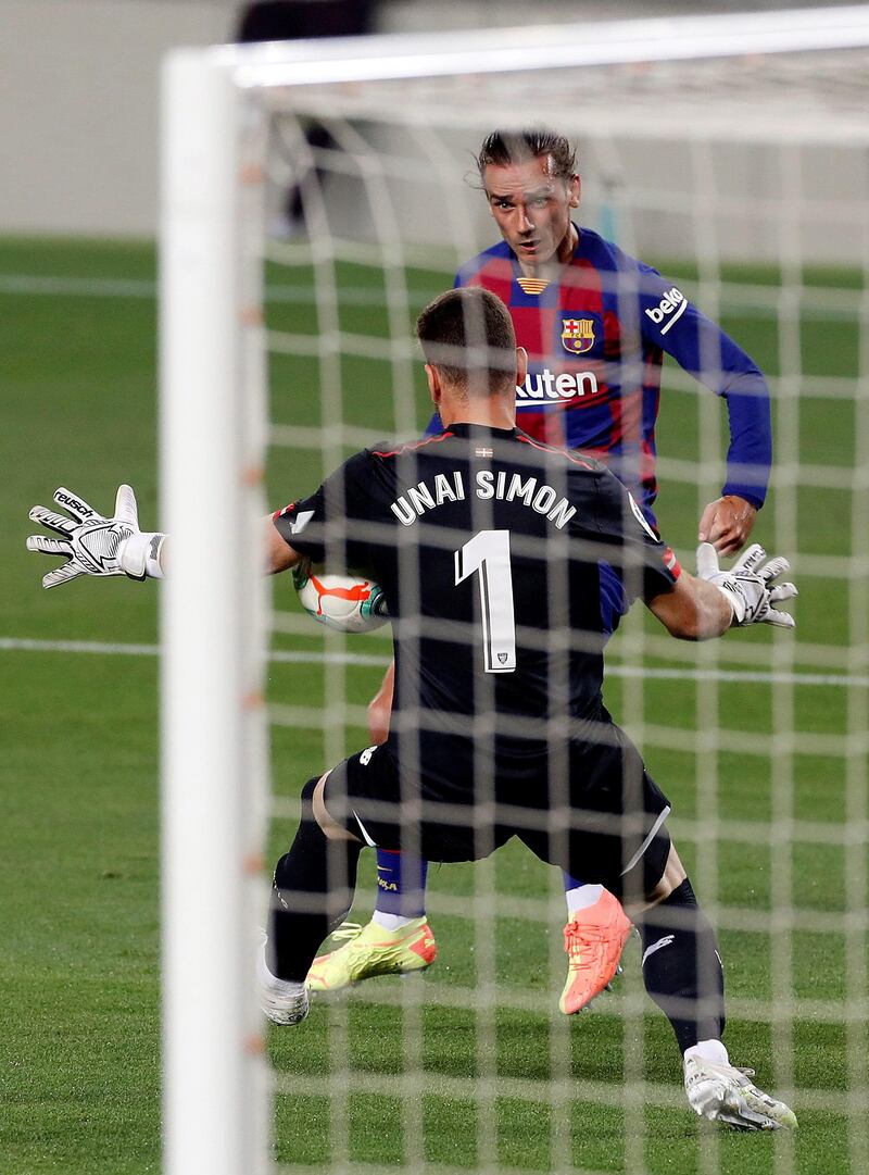 Barcelona's Antoine Griezmann attempts to finish past Bilbao goalkeeper Unai Simon. EPA