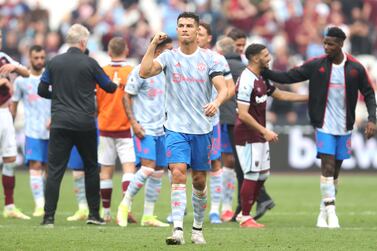 LONDON, ENGLAND - SEPTEMBER 19: Cristiano Ronaldo of Manchester United celebrates victory after the Premier League match between West Ham United and Manchester United at London Stadium on September 19, 2021 in London, England. (Photo by Julian Finney / Getty Images)