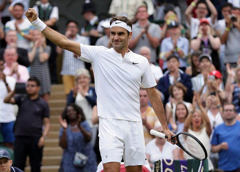 Roger Federer celebrates after beating Mischa Zverev. Tim Ireland / AP Photo