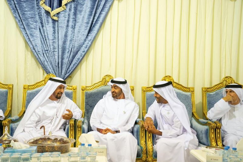 Al AIN, ABU DHABI, UNITED ARAB EMIRATES - December 16, 2018: HH Sheikh Mohamed bin Zayed Al Nahyan, Crown Prince of Abu Dhabi and Deputy Supreme Commander of the UAE Armed Forces (2nd L), offers condolences to the family of Abdulla bin Jaber Al Khaili, in Al Ain.

( Mohamed Al Hammadi / Ministry of Presidential Affairs )
---