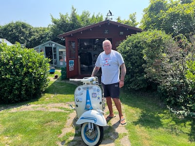 David Aean, Clacton-on-Sea resident, showing off one of his collection of vintage Vespa scooters. The National