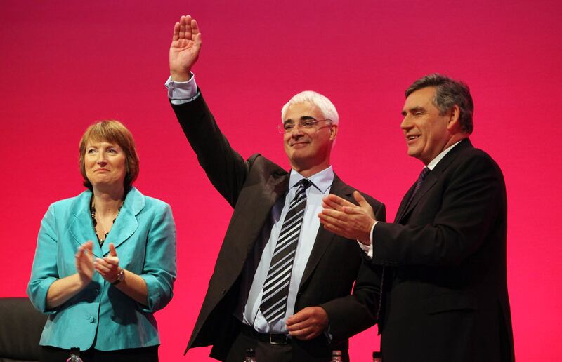 Mr Darling with then Prime Minister Gordon Brown and Deputy Leader of the Labour Party Harriet Harman at the Labour Party Conference in 2009