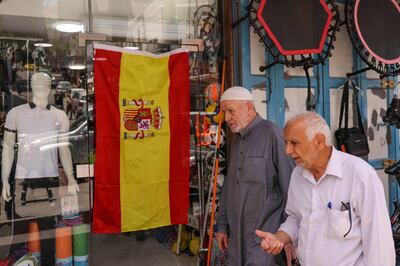 The flag of Spain in a shop window in the city centre of Hebron in the occupied West Bank. AFP