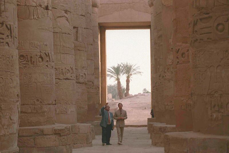 Prince Charles visits the Karnak Temple Complex during a visit to Egypt in 1995. Getty