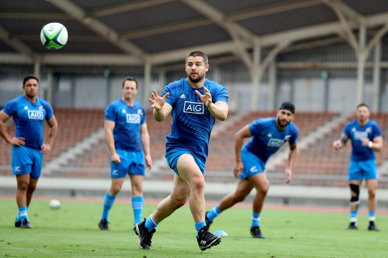 Dane Coles receives a pass during training in Kashiwa on Wednesday. Getty