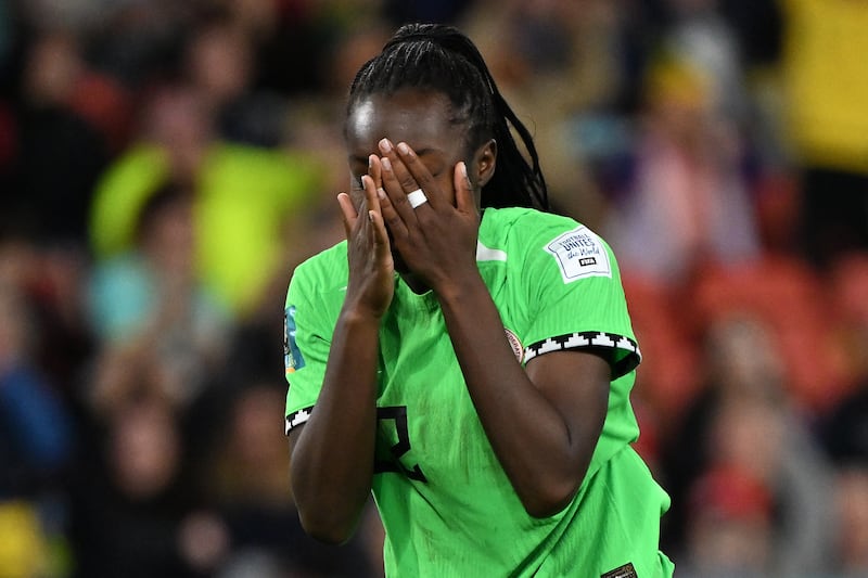Michelle Alozie of Nigeria reacts after Chloe Kelly of England hit the winning penalty. EPA 