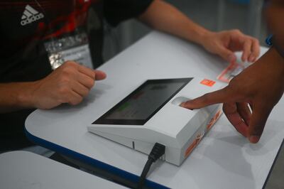 An electronic voting machine at a polling station near Rocinha, Rio de Janeiro's biggest favela, on Sunday. AFP