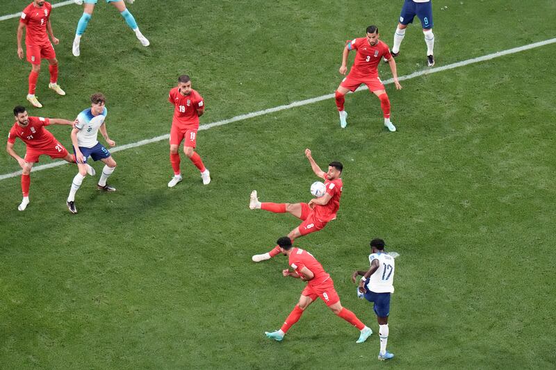 England's Bukayo Saka, bottom right, scores his first of two goals with a half-volley. AP Photo