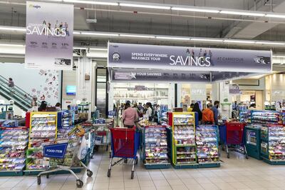 DUBAI, UNITED ARAB EMIRATES. 01 OCTOBER 2019. New signage up at Carrefour for their new deals, loyalty programmes, credit cards, promotions and tips to help you slash your costs. (Photo: Antonie Robertson/The National) Journalist: Nada El Sawy. Section: National.
