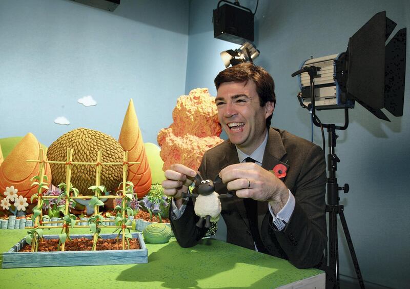 BRISTOL, UNITED KINGDOM - OCTOBER 23:  Culture Secretary, Andy Burnham laughs on set at Aardman animation studios and meets their new character Timmy from Timmy Time as part of visit to highlight Britain's creative industries on October 23, 2008 in Bristol, England. The visit to the studios, best known for their Wallace and Grommit and Creature Comforts productions, coincided with an update on the progress of the creative economy, as well as giving details about a new international conference for creative business leaders.  (Photo by Matt Cardy/Getty Images)