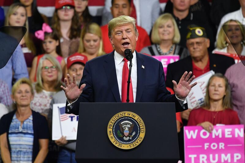 US President Donald Trump speaks during rally at Freedom Hall Civic Center in Johnson City, Tennessee on October 1, 2018. / AFP / MANDEL NGAN

