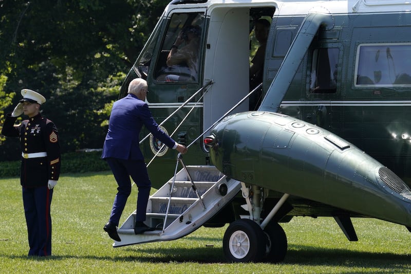 Mr Biden boards Marine One on the South Lawn of the White House in Washington. Bloomberg