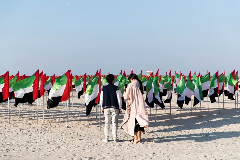 DUBAI, UNITED ARAB EMIRATES - NOVEMBER 29, 2018. 

Two women take photos for their instagram at Flag Garden on Kite Beach.

(Photo by Reem Mohammed/The National)

Reporter: 
Section:  NA POAN