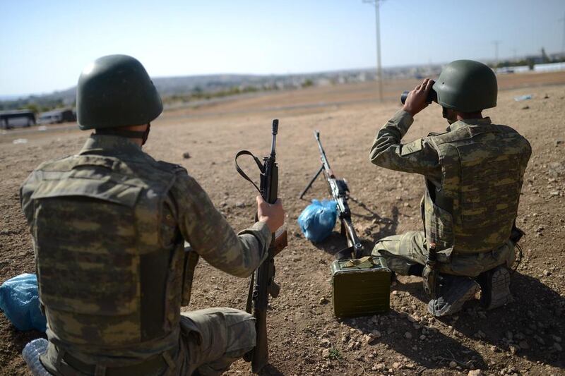 Many in the Turkish opposition and a growing number of Western analysts have argued that Turkey has turned a blind eye to ISIL. Bulent Kilic / AFP Photo

