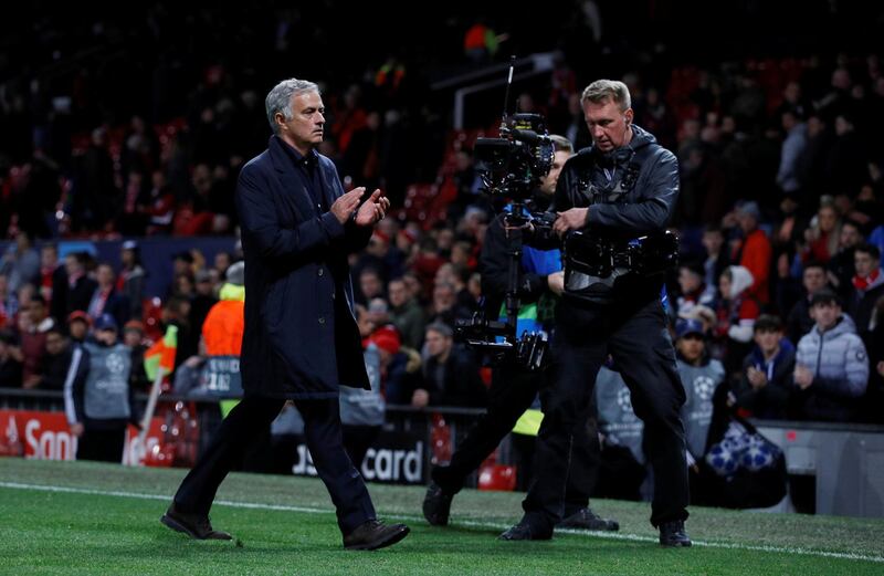 Manchester United manager Jose Mourinho applauds fans after the match. Reuters