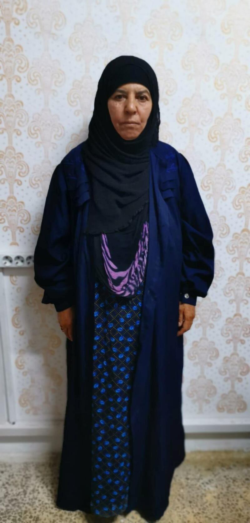 Rasmiya Awad, believed to be the sister of slain Islamic State leader Abu Bakr al-Baghdadi, who was captured on Monday in the northern Syrian town of Azaz by Turkish security officials, is seen in an unknown location in an undated picture provided by Turkish security officials. Turkish Security Officials/Handout via REUTERS ATTENTION EDITORS - THIS IMAGE HAS BEEN SUPPLIED BY A THIRD PARTY.