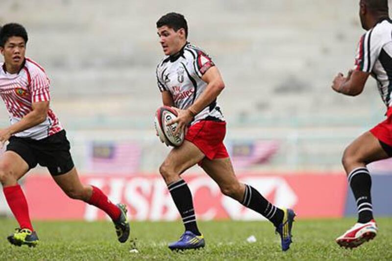 Adel Al Hendi, centre, is one of the most promising rugby union players in the UAE. Photograph courtesy of Elite Step
