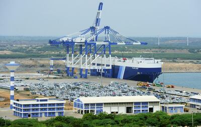 TO GO WITH SriLanka-economy-infrastructure,FOCUS by Amal Jayasinghe 
In this photograph taken on February 10, 2015, shows a general view of the port facility at Hambantota.  From a multi-million dollar airport ignored by airlines to a lavish cricket stadium rejected by players, Sri Lanka's new government is mulling the future of a string of white elephants.      AFP PHOTO / LAKRUWAN WANNIARACHCHI / AFP PHOTO / LAKRUWAN WANNIARACHCHI