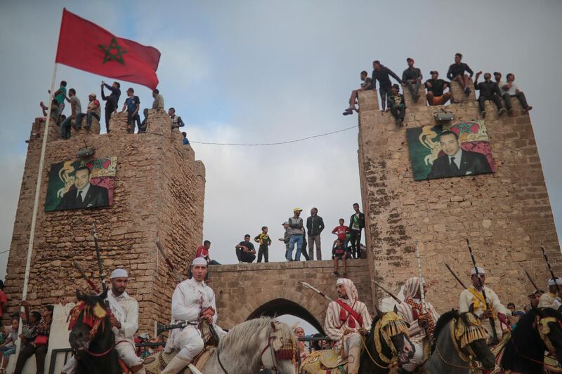 Thousands of visitors descend on the Moroccan coastal city of El Jadida each July to attend the largest equestrian show in the kingdom _ a breathtaking horseback performance that combines synchronised riding with decorative guns. The competitive event is known as Tabourida, or La'ab Al-Baroud, "The Game of Powder."