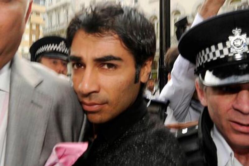 Pakistani cricketer Salman Butt (C) arrives at the Pakistan High Commission in London in this September 2, 2010 file photo. Test captain Salman Butt and his two leading pace bowlers Mohammad Amir and Mohammad Asif were suspended after newspaper reports that they arranged for no-balls to be deliberately bowled in the fourth test against England at Lord's last month. The trio have maintained that they are innocent of spot-fixing, an offence which carries a maximum life ban.   REUTERS/Paul Hackett/Files   (BRITAIN - Tags: SPORT CRICKET CRIME LAW)