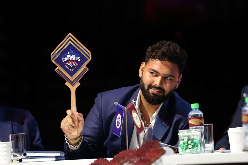 Wicketkeeper batsman Rishabh Pant makes a bid for Delhi Capitals during the IPL 2024 auction at the Coca-Cola Arena in Dubai. Sportzpics for IPL