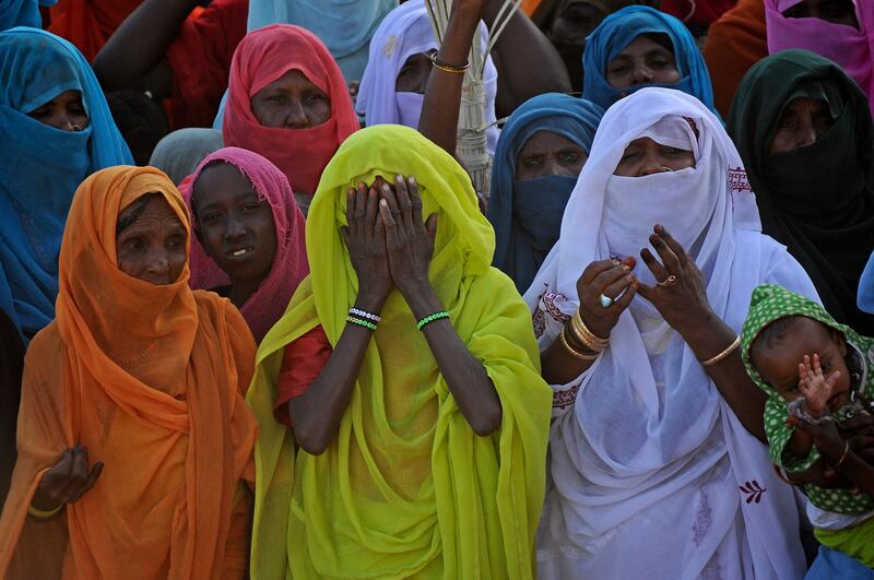 Sudanese attend the annual celebration of Al-Sharifa Mariam Al-Mirghani, in Sinkat. AFP