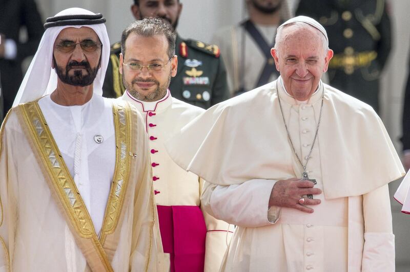 04 February 2019, United Arab Emirates, Abu Dhabi: Pope Francis (R) smiles next to Dubai ruler Sheikh Mohammed bin Rashid Al-Maktoum upon his arrival to the presidential palace. The Pope is on the first ever papal visit to the Arab Peninsula. Photo: Gehad Hamdy/dpa (Photo by Gehad Hamdy/picture alliance via Getty Images)