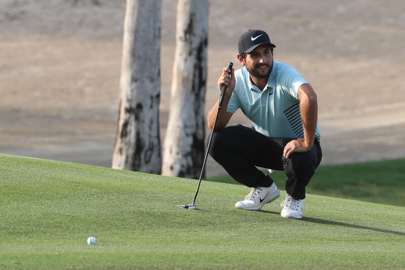 Alexander Levy of France eyes the ball during day three of the Dubai Desert Classic at Emirates Golf Club on January 27, 2018, in Dubai. / AFP PHOTO / KARIM SAHIB