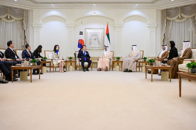 Sheikh Abdullah, Mr Yoon and Ms Kim with Mr Al Mazrouei, Ms Al Kaabi, Mr Al Mubarak and other officials