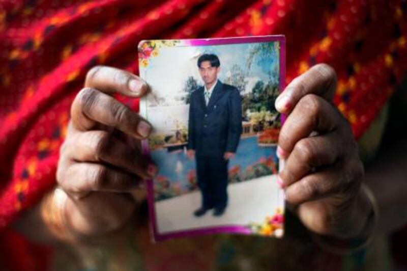 April 2, 2010 - 50-year old Veer Kaur holds a photograph of her son Sukhjinder Singh who is one of 17 Indians sentenced to death by a court in Sharjah for killing a Pakistani man in January 2009 following a fight over an illegal liquor business. 
Photo: Charla Jones for The National