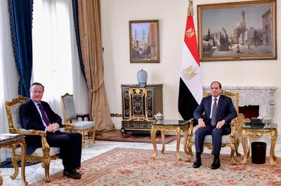 Egyptian President Abdel-Fattah Eli Sisi, right, with British Foreign Secretary Lord Cameron, left, at the Presidential Palace in Cairo. AP Photo
