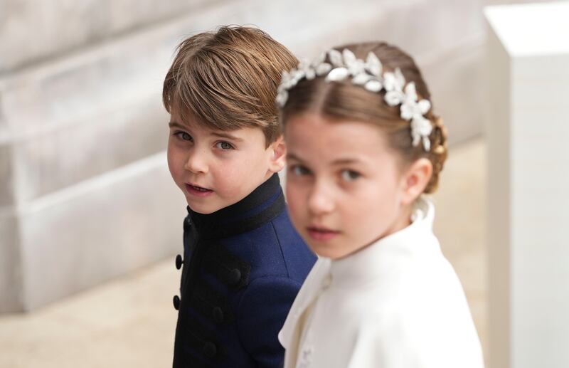 Princess Charlotte and Prince Louis, children of William, Prince and Wales, and Catherine, Princess of Wales, arrive at Westminster Abbey for the coronation of King Charles III and Queen Camilla. Getty Images