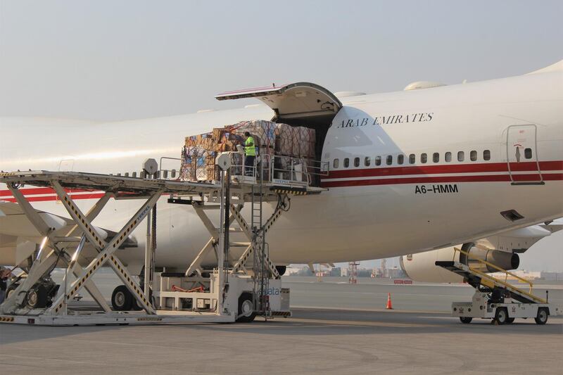 A handout image obtained from Dubai's Media Office on August 5, 2020 shows workers preparing to load a plane with aid to the Lebanese people in Dubai. The death toll from a huge blast at Lebanon's Beirut port has risen to at least 113, as at least 4,000 people were wounded while dozens of people were still missing as rescue efforts continued, according to the country's health minister. - XGTY / RESTRICTED TO EDITORIAL USE - MANDATORY CREDIT "AFP PHOTO / DUBAI MEDIA OFFICE" - NO MARKETING - NO ADVERTISING CAMPAIGNS - DISTRIBUTED AS A SERVICE TO CLIENTS
 / AFP / GOVERNMENT OF DUBAI MEDIA OFFICE / - / XGTY / RESTRICTED TO EDITORIAL USE - MANDATORY CREDIT "AFP PHOTO / DUBAI MEDIA OFFICE" - NO MARKETING - NO ADVERTISING CAMPAIGNS - DISTRIBUTED AS A SERVICE TO CLIENTS
