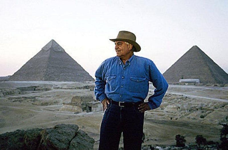 STNE SCANS-00005.jpg...Dr Zahi Hawass, Head of Supreme Council of Antiquities Egypt, standing infront of the Pyramids. 
Giza, Egypt.
May 2002
(C) Karen Davies/National Geographic Channel