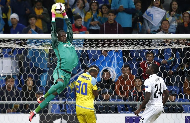 BSC Young Boys’ goalkeeper Yvon Mvogo takes the ball against Astana. EPA / THOMAS HODEL