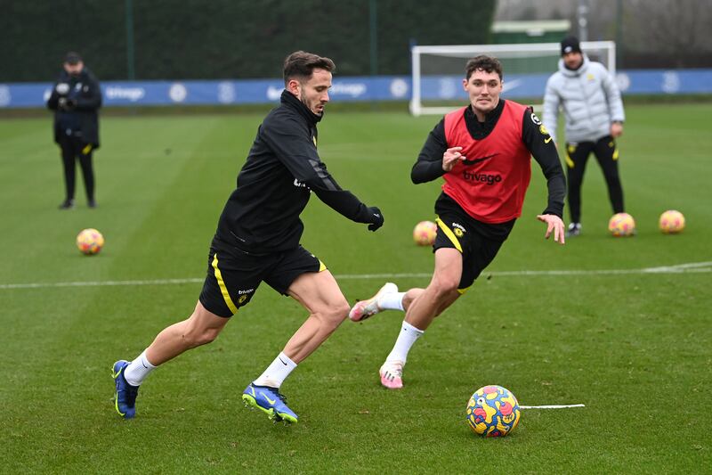 Saul Níguez and Andreas Christensen in action.