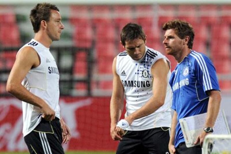 Andre Villas-Boas, the Chelsea manager, right, has kept a tight leash on his players during pre-season so far.