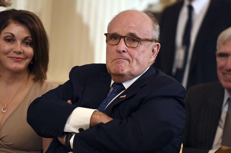 (FILES) In this file photo Lawyer of the US president Rudy Giuliani looks on before the US president announces his Supreme Court nominee in the East Room of the White House on July 9, 2018 in Washington, DC.  US President Donald Trump had conversations about a proposed project to build a Trump Tower in Moscow throughout the 2016 presidential campaign, far later than previously acknowledged, his lawyer said January 20, 2019. Trump's conversations with his then personal lawyer and fixer, Michael Cohen, who was spearheading the negotiations in Moscow, continued throughout the year until October or November 2016, Rudy Giuliani said."It's our understanding that they went on throughout 2016 -- there weren't a lot of them, but there were conversations," the former New York mayor said on NBC's "Meet the Press."
 / AFP / SAUL LOEB
